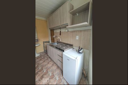 Sala e cozinha de kitnet/studio para alugar com 1 quarto, 16m² em Vicentina, São Leopoldo
