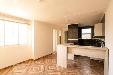 Sala/Cozinha de apartamento à venda com 2 quartos, 50m² em Vila Nova, Porto Alegre