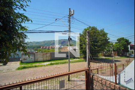 Sacada _Vista de casa à venda com 3 quartos, 253m² em Jardim Carvalho, Porto Alegre