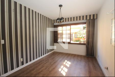 Sala de casa de condomínio à venda com 3 quartos, 165m² em Medianeira, Porto Alegre