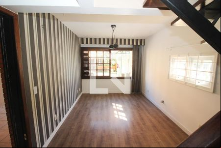 Sala de casa de condomínio à venda com 3 quartos, 165m² em Medianeira, Porto Alegre