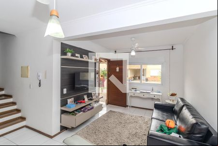 Sala de casa de condomínio à venda com 3 quartos, 98m² em Harmonia, Canoas