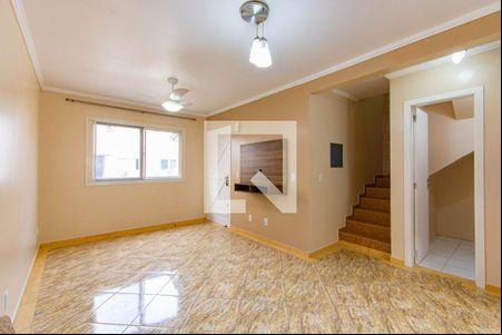 Sala de casa de condomínio à venda com 3 quartos, 109m² em Fátima, Canoas