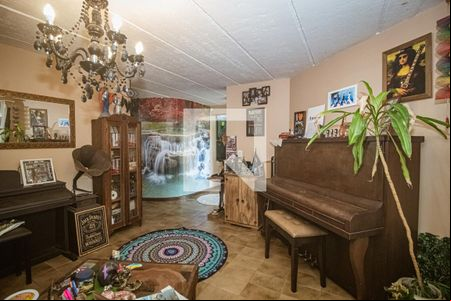 Sala de casa à venda com 4 quartos, 170m² em Ipanema, Porto Alegre