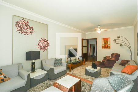 Sala de casa à venda com 3 quartos, 250m² em Auxiliadora, Porto Alegre