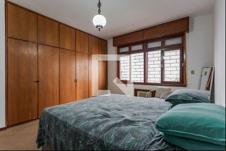 Quarto 1 de casa à venda com 6 quartos, 414m² em Auxiliadora, Porto Alegre
