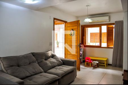 Sala de casa de condomínio à venda com 3 quartos, 133m² em Tristeza, Porto Alegre
