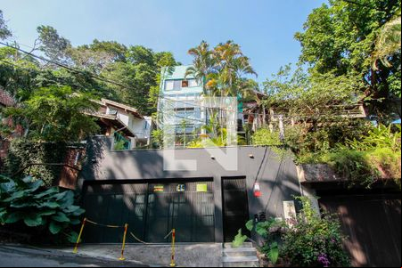 Fachada de casa de condomínio para alugar com 4 quartos, 560m² em Itanhangá, Rio de Janeiro
